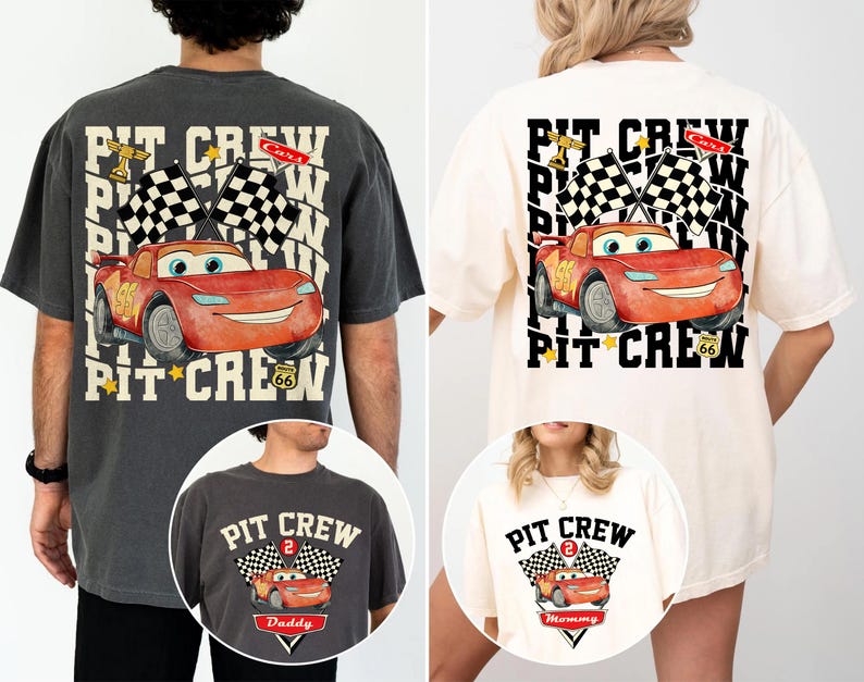 May include: Two t-shirts with a red race car graphic and the words "PIT CREW". One is dark grey, the other cream. The design includes checkered flags and the car's number. The shirts are likely for a family.