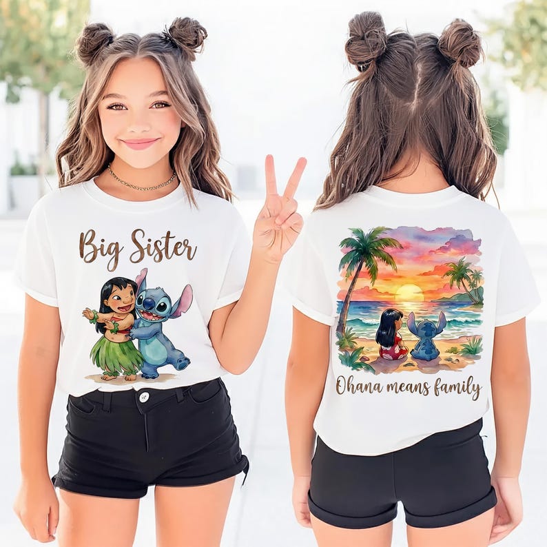 May include: White t-shirt with a "Big Sister" graphic featuring Lilo and Stitch. The back of the shirt displays a beach scene with palm trees, Lilo, and Stitch, and the text "Ohana means family". The shirt is paired with black shorts.