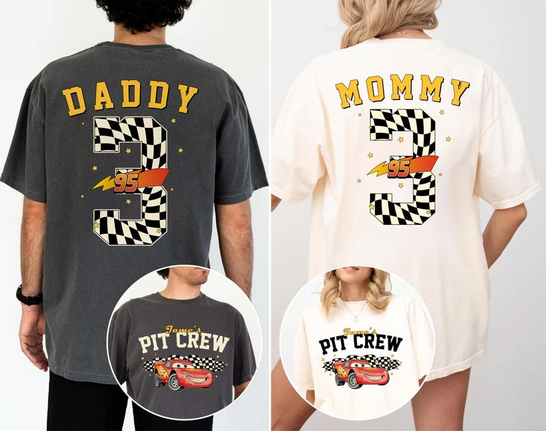 May include: Two oversized t-shirts, one charcoal gray and one cream, feature racing-themed designs. The gray shirt says "DADDY" above a checkered number 3 with "95" and a lightning bolt. The cream shirt says "MOMMY" with a similar design.