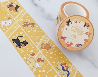 May include: A roll of yellow washi tape with a repeating pattern of fire-type Pokemon running. The tape is labeled "Washi Tape Running Starters Fire".