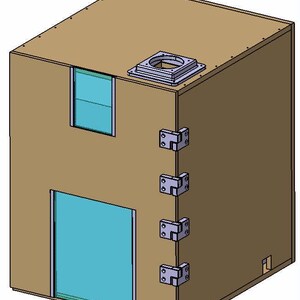 May include: A tan rectangular box with a small rectangular window and a larger door, both with blue-green glass. The box has a metal fitting on top and metal hinges on the side. The design appears to be a technical drawing or a 3D model.