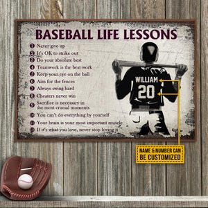 May include: A framed baseball-themed print with the text "Baseball Life Lessons" and a silhouette of a baseball player. The print includes a baseball glove and ball in the lower left corner. The text "Name & Number Can Be Customized" is also present.