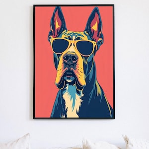 May include: Pop art style dog portrait wearing yellow sunglasses against a coral background. The dog has blue, yellow, and white markings, and is framed in a black border. A fun and colorful piece of wall art.