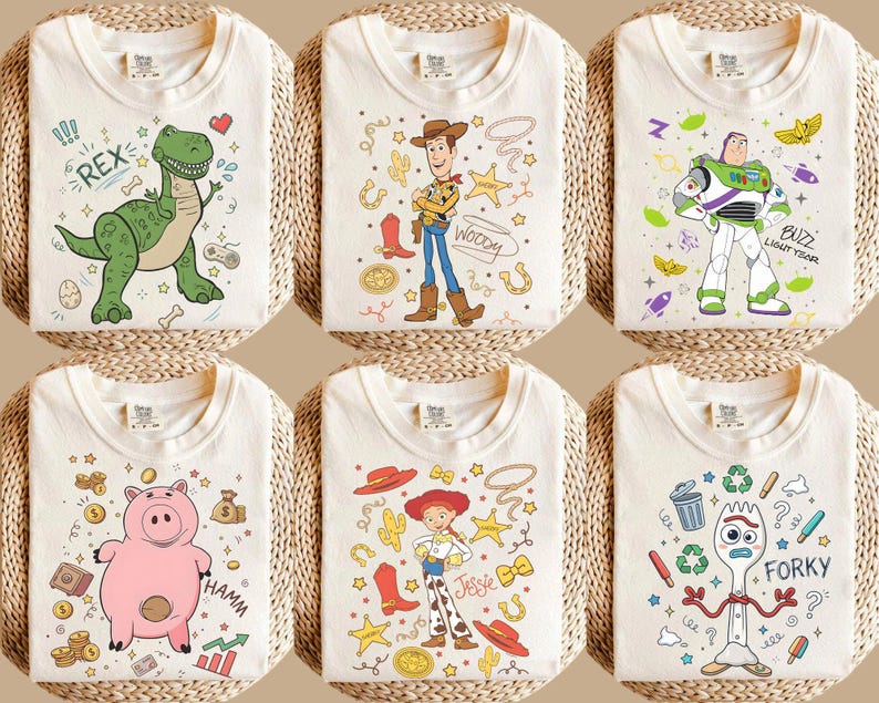 May include: Six off-white t-shirts with cartoon character designs. Each shirt features a different character: Rex the dinosaur, Woody the cowboy, Buzz Lightyear, Hamm the pig, Jessie the cowgirl, and Forky. The designs are in various colors.