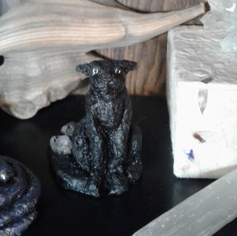 Black cat with crystal figurine recycled art