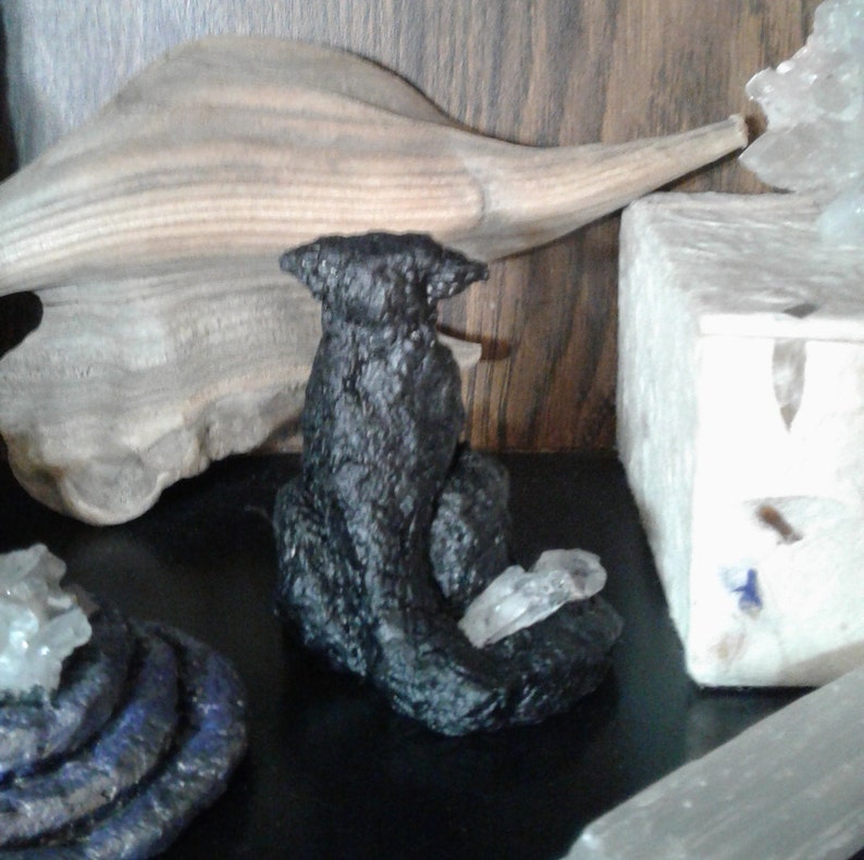 Black cat with crystal figurine recycled art