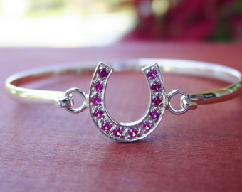 Handgemaakte sterlingzilveren hoefijzerarmband met zirkonia's