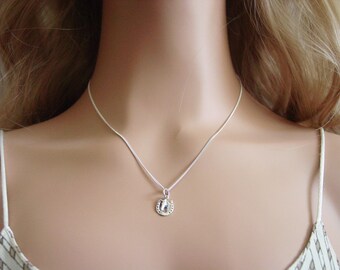 Colgante de herradura de plata de ley con cabeza de caballo - Joyería ecuestre