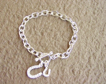 CZ hoefijzer bedel schakelarmband: sterlingzilveren ruitersieraden