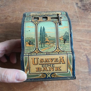 Antique Tin Coin Bank UsaveA Dime Bank Shonk Works American Can Co. with Beautiful Art Nouveau Graphics 20&#39;s Metal Mechanical Saving Bank