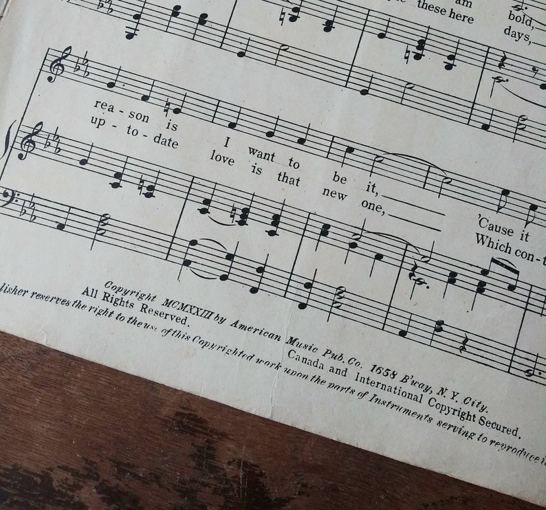 May include: A sheet music page with musical notes and lyrics. The lyrics include "I want to be it, new one, 'Cause it Which con-t". The copyright information reads "Copyright MCMXXII by American Music Pub. Co. 1658 B'way, N.Y. City. All Rights Reserved. Canada and International Copyright Secured."
