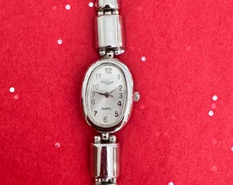 Vintage Silver Ladies Wrist Watch small Oval Face with numerals by Luisant