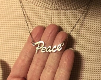 6X22Mm 1 Silver Plated Pewter Peace Word Tag Charm