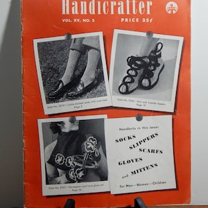 May include: A magazine cover for Bernat's Handicrafter, Volume XV, Number 2. The cover features three photos of knitted items: a pair of cable-clocked socks, a pair of knit and crochet slippers, and a Norwegian scarf and glove set. The cover also lists the handknits featured in the issue: socks, slippers, scarfs, gloves, and mittens.