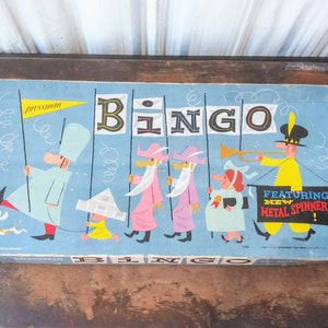 Juego de bingo vintage Pressman con cartones de bingo y lata metálica Litho Spinner, juego de mesa de mediados de siglo de los años 50.