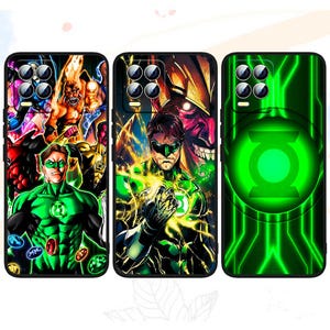 May include: Three phone cases with Green Lantern designs. The cases show vibrant comic book art with the Green Lantern logo and characters in shades of green, yellow, and red. The cases have a black border and a camera cut-out.