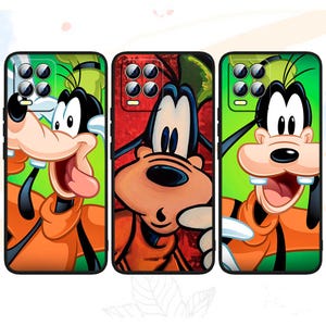 May include: Three phone cases featuring a cartoon image of Goofy. The cases are black with a green, red, and orange background. The Goofy character is smiling with his tongue sticking out.
