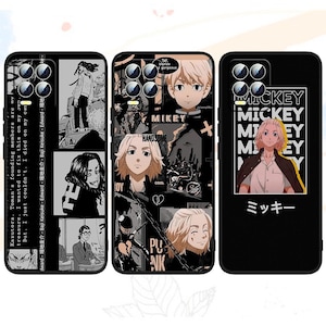 May include: Three black phone cases featuring anime character designs. One case has a collage of images and text, another has a character portrait, and the third has a character illustration with Japanese text.