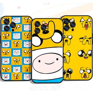 May include: Three phone cases with cartoon character designs. One case has a blue and yellow chequered pattern with cartoon faces. The second case is yellow with a cartoon character face. The third case is yellow with cartoon faces.