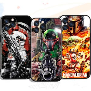 May include: Three phone cases with Star Wars-themed graphics. One case features a Stormtrooper, another Boba Fett, and the third showcases The Mandalorian and Grogu. The cases have black borders and colorful, detailed illustrations.