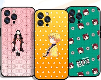 May include: Three phone cases with anime-style character designs. One case is pink with a geometric pattern and a character illustration. Another is yellow with a triangle pattern and a character illustration. The third is green with character illustrations and Japanese text.