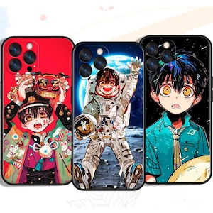 May include: Three phone cases with anime-style illustrations. One case is red with a character holding a mask, another is blue with an astronaut, and the third is black with a character in a teal shirt.