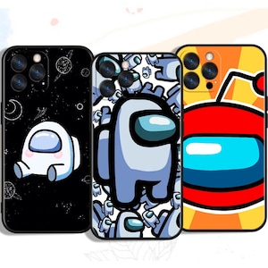 May include: Three phone cases featuring Among Us game characters. One case has a white character on a black space background. Another has a white character on a white background. The third case has a red and blue character on an orange background.