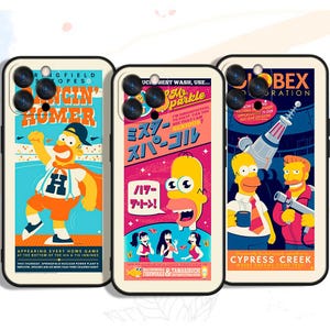 May include: Three phone cases with vibrant cartoon designs. One case features a character in orange with the text "RINGFIELD STOPES HOMER". Another case has a yellow character with Japanese text. The third case has two characters with the text "CYPRESS CREEK".