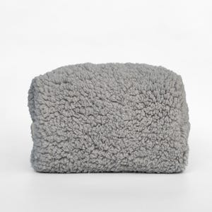 Sherpa make-uptasje, pluizig make-uptasje voor toiletartikelen en huidverzorging.