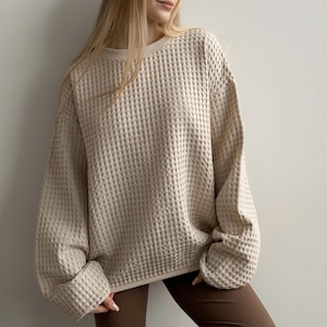 Stickad tröja i våffelbomull: Stora bekväma loungekläder