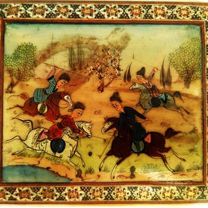 May include: A rectangular, hand-painted miniature painting depicting a polo match. The artwork features several figures on horseback, engaged in a game, with a detailed border. The color palette includes earth tones, with accents of red, blue, and white.