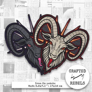 May include: Embroidered iron-on patch featuring a goat head design with a red tongue and horns. The patch is cream, black, and red, with the text "Crafted by Rebels" in a circle. The patch measures 6.8 x 7.1 inches.
