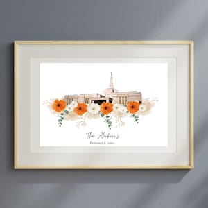Op de afbeelding: Een ingelijst afdruk met een aquarel-illustratie van een tempel met oranje en witte bloemen. De tekst "The Ahokovi's February 8, 2020" staat onderaan de afdruk.