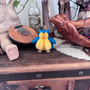Shiny Snorlax Figurine Gold & Blue  – Cute Pokémon-Inspired Collectible Decor