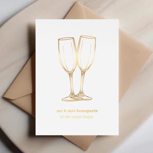 Noms personnalisés de Mr et Mme - carte de mariage personnalisée, look doré minimaliste, carte d'invité élégante pour les jeunes mariés, que la magie commence, cadeau d'invité