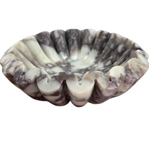 lose-up view of the marble jewelry organizer highlighting its fine texture, subtle color variations, and hand-polished surface, showcasing artisan quality and natural beauty of the marble veins