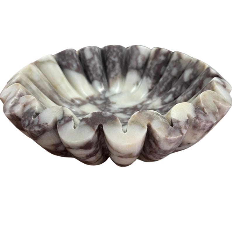 lose-up view of the marble jewelry organizer highlighting its fine texture, subtle color variations, and hand-polished surface, showcasing artisan quality and natural beauty of the marble veins