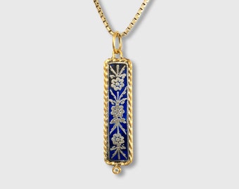 Framed, 24kt Yellow Gold, Long Blue & Silver, Enameled Pendant with flowers and with 0.02ct Diamonds