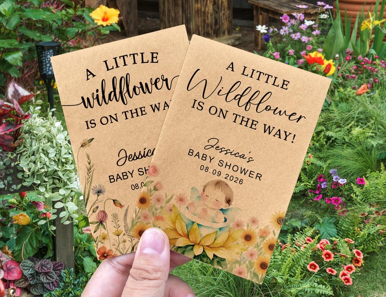 May include: Two kraft paper baby shower announcements with floral illustrations and the text "A Little Wildflower Is On The Way!". The announcements include the name "Jessica's" and the date "08.09.2026".