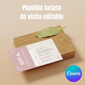 May include: A pink and white business card with the text "SPA Belleza y Moda" in a white box with a pink border. The card also includes contact information, including a phone number, address, website, and social media handles.