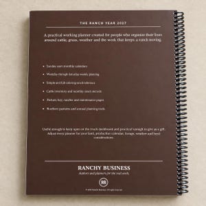 May include: A dark brown spiral-bound planner titled The Ranch Year 2027. The back cover lists features including Sunday start monthly calendars, weekly planning, cattle inventory, and ranch records. The bottom displays Ranchy Business branding.