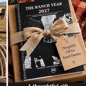 May include: A spiral-bound planner titled The Ranch Year 2027, A Ranch Business Working Planner, featuring a black and white cow graphic. It is wrapped in brown paper with a burlap ribbon and a tan gift tag reading A Thoughtful Gift for Ranch Families.