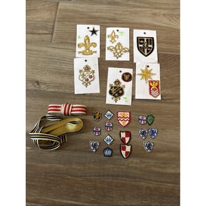 Lot Vintage Applique Patch Samples on Cards Heraldic Crests Ribbons Gold Tone