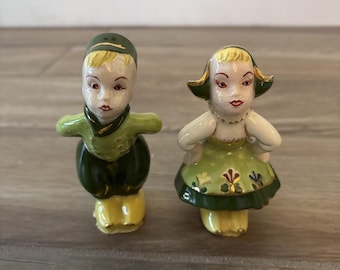 Vintage Dutch Figurines Girl And Boy Kissing 7 inches tall Set of 2
