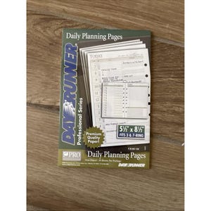 May include: A package of Day-Runner Professional Series daily planning pages. The green and white packaging displays the text Daily Planning Pages, 5 1/2 x 8 1/2 fits 3 & 7-ring, and Premium Quality Paper. It contains 30 non-dated sheets.