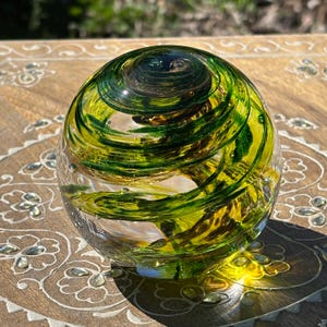 Handblown Glass Paperweight: Yellow Green Gold Swirl Orb