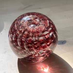 Handblown Glass Paperweight: Dark Red & Gold Vortex - Signed Art Glass