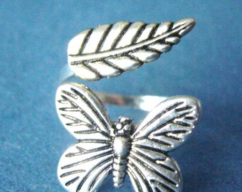 silver butterfly ring with a leaf open warp style, adjustable ring