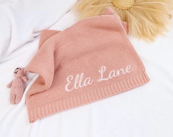 Custom name baby blanket, ultra-soft cotton knit, cozy & breathable, embroidered keepsake gift for newborns and baby showers.