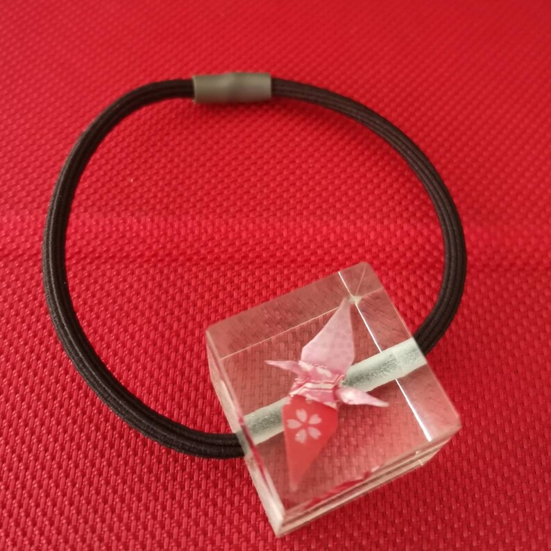 Mini Eternity Origami Crane in Epoxy Cube with hair tie